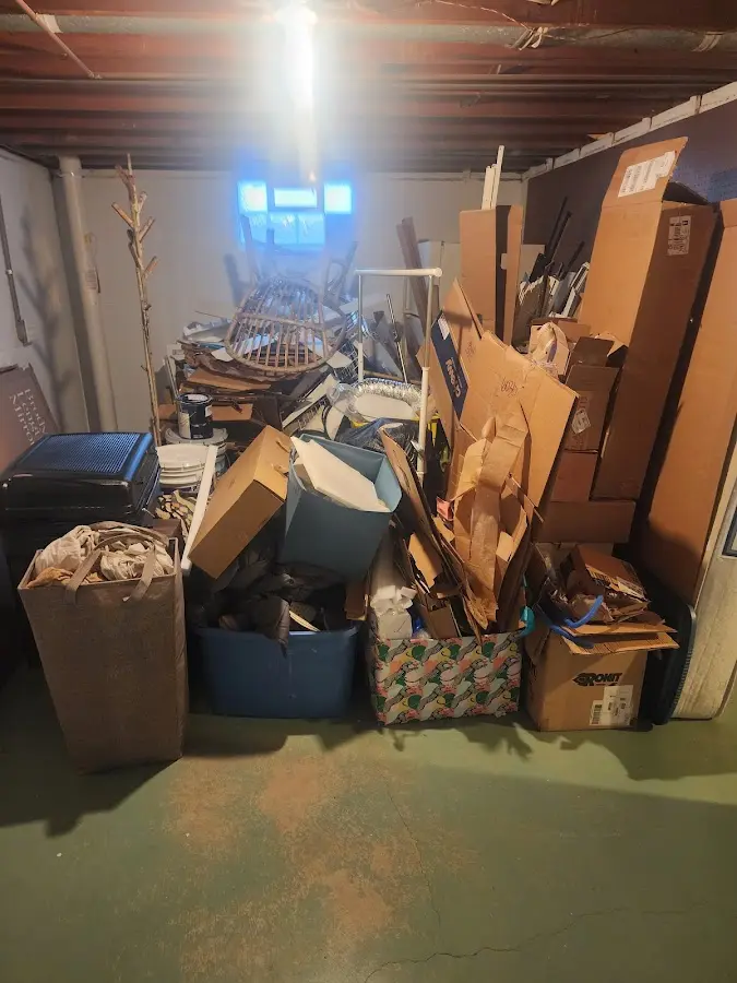 Roll-off dumpster container at job site for Cleanout Dumpster Rental in Calhoun